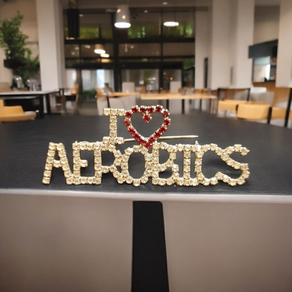 WOMEN'S " I LOVE AEROBICS RHINESTONE PIN".